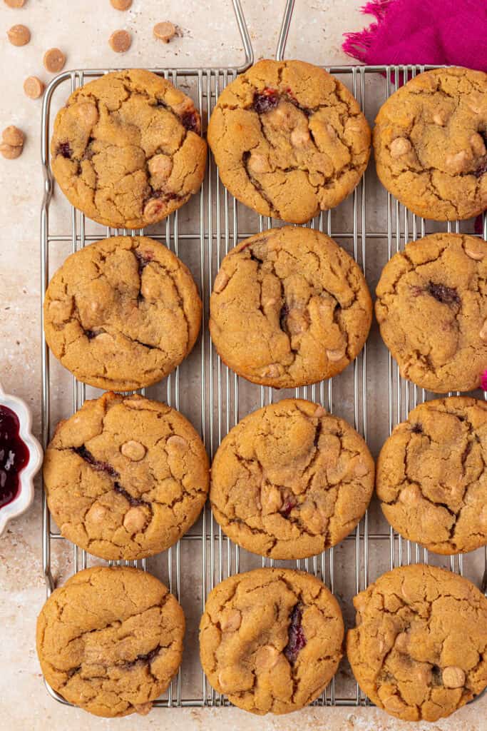 peanut butter and jelly cookies on a wire rack