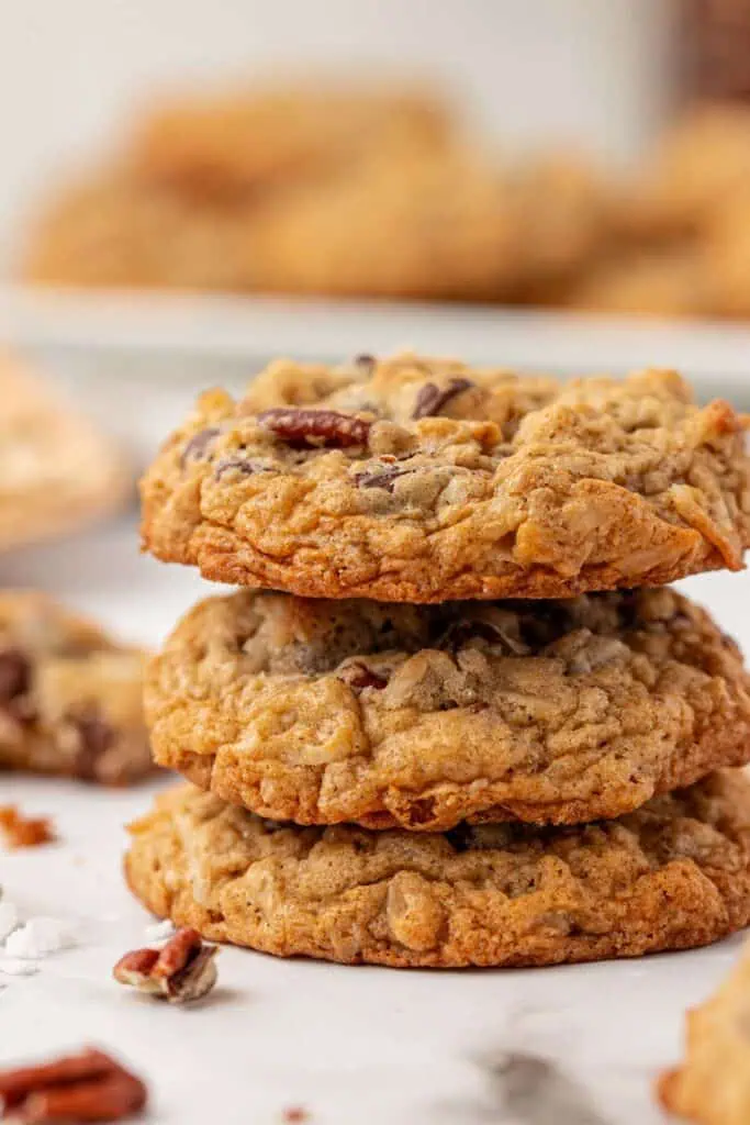 three cowboy cookies stacked on top of each other