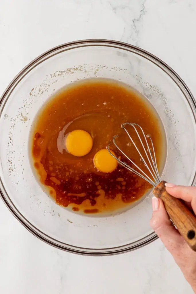egg, egg yolk, and vanilla added to cookie mixture