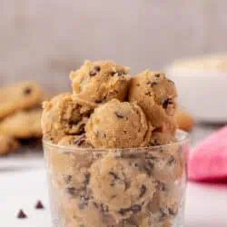 a glass bowl of edible cookie dough balls
