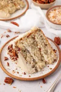 slice of italian cream cake on a plate