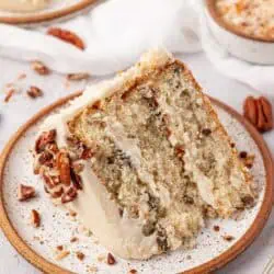 slice of italian cream cake on a plate