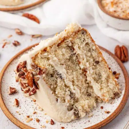slice of italian cream cake on a plate
