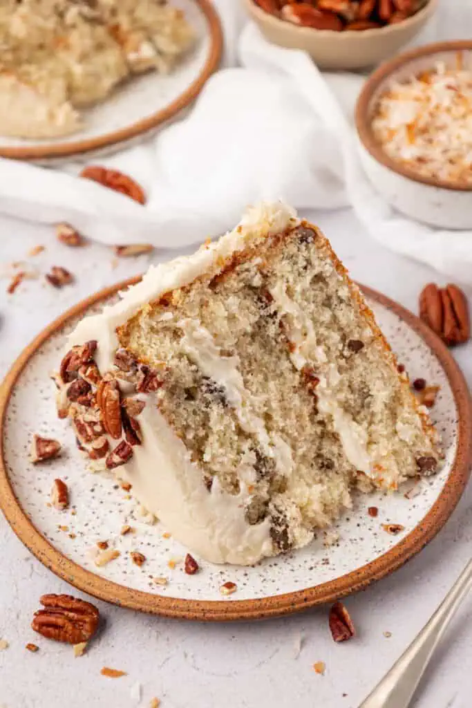 slice of italian cream cake on a plate