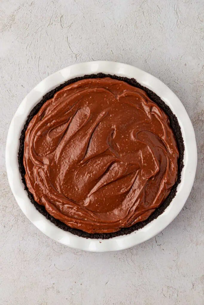 pudding spread on top of brownie layer