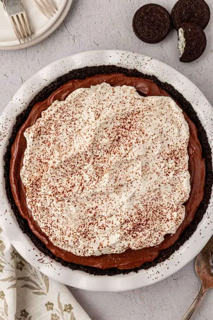whole mississippi mud pie topped with whipped cream