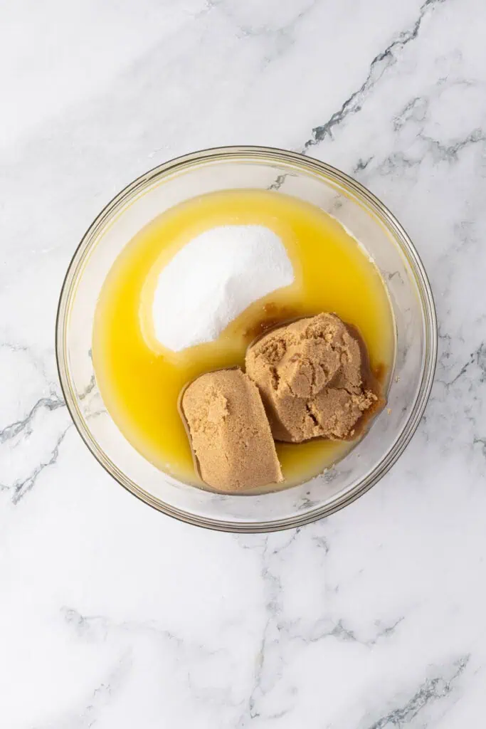 butter and sugars in a bowl