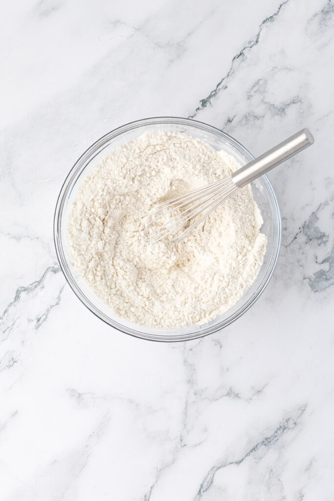 dry ingredients in a bowl with a whisk