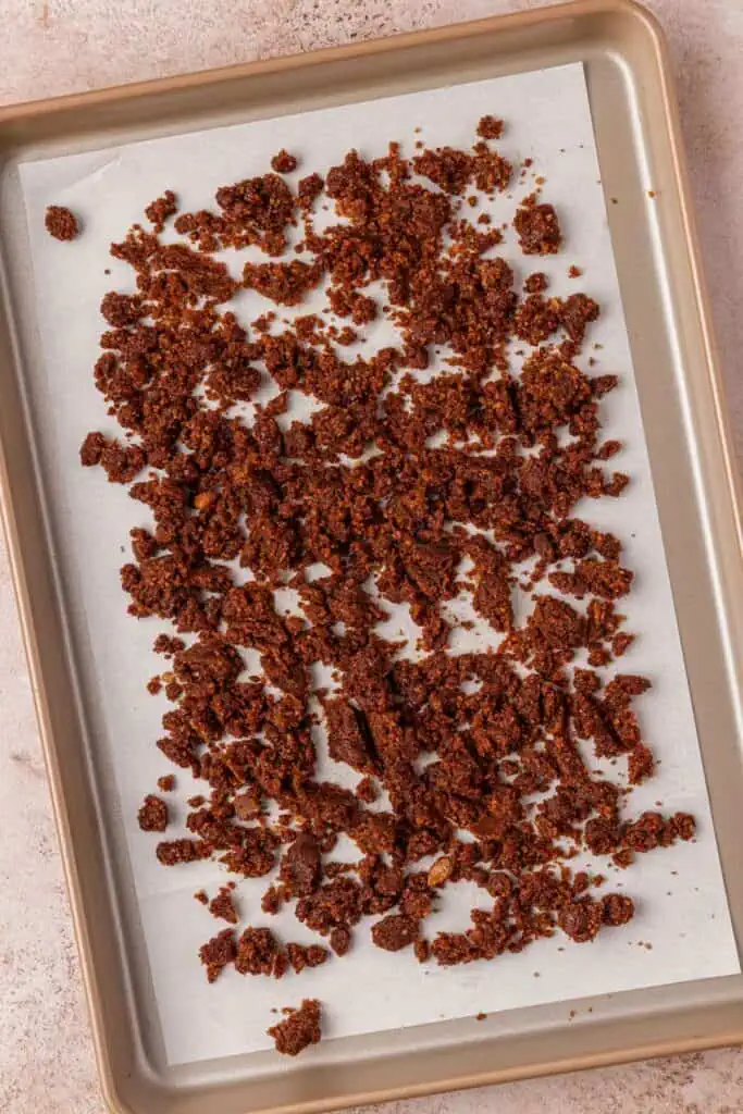 streusel spread out on a cookie sheet