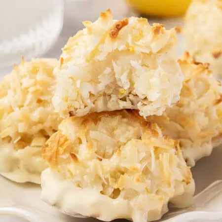 two coconut macaroons stacked on top of each other