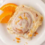 orange cinnamon roll on a plate
