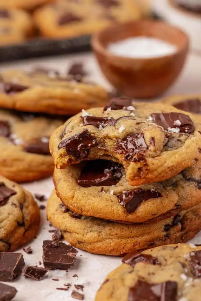 a stack of bakery style chocolate chip cookies