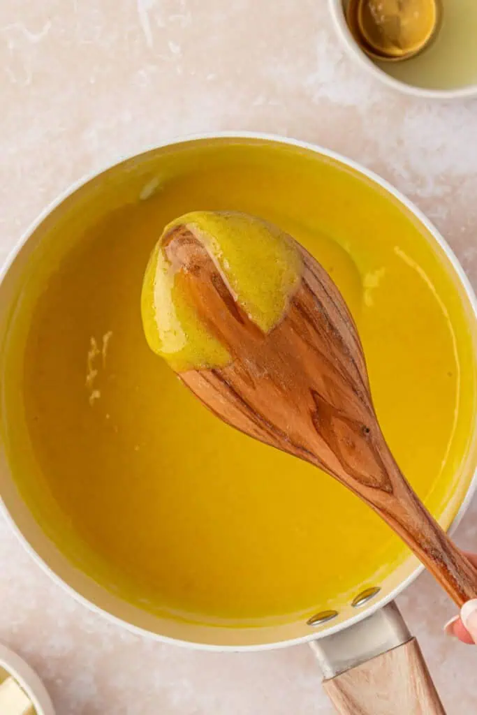 lemon curd coating the back of the spoon
