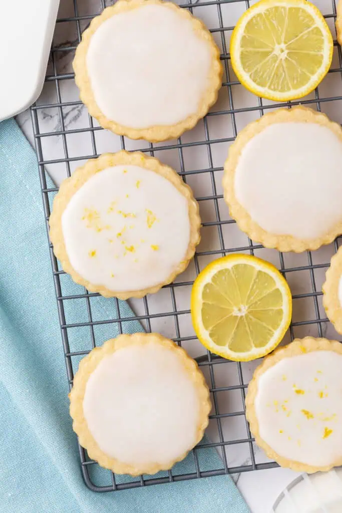 iced lemon shortbread cookies on a wire rack