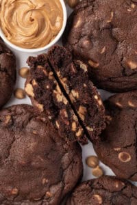 a bunch of cookies and one is folded in half