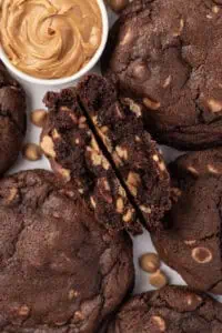 a bunch of cookies and one is folded in half