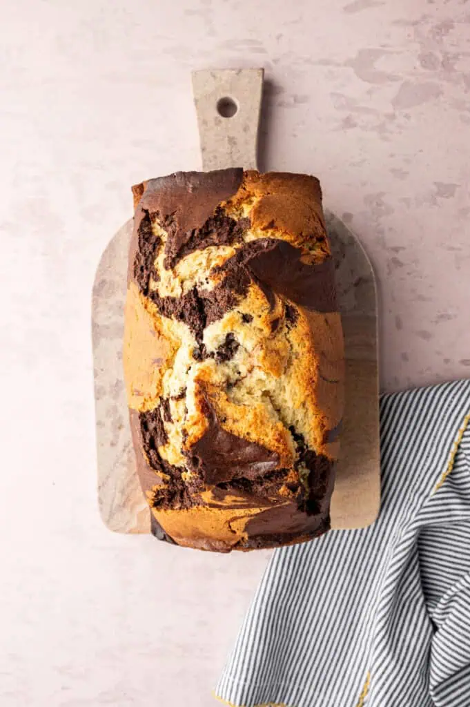 baked marble pound cake on a cutting board