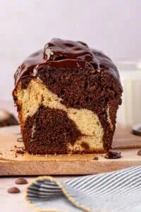 marble loaf cake cut in half on a cutting board