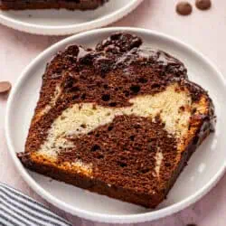 a slice of marble loaf cake on a plate
