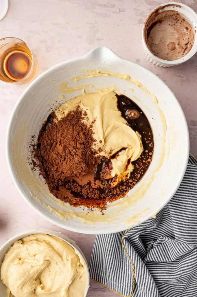 cocoa powder and hot coffee added to the bowl