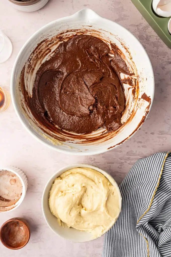 one bowl of chocolate batter and one bowl of vanilla cake batter