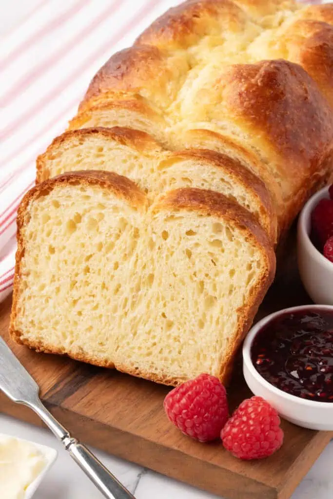 sliced brioche bread on a cutting board