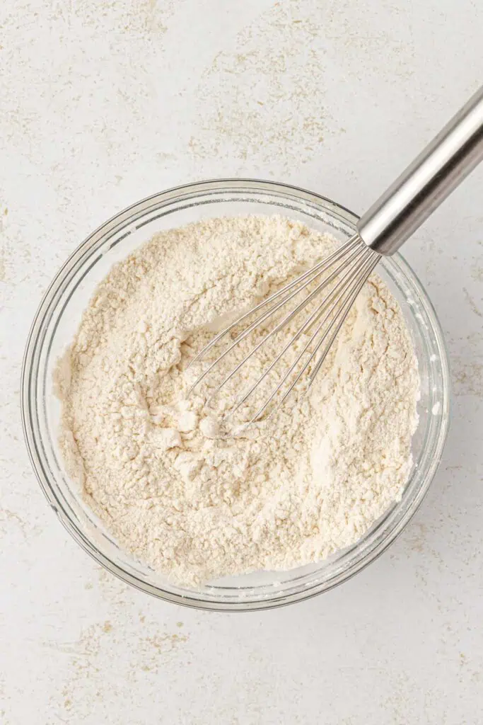 dry ingredients in a bowl with a whisk