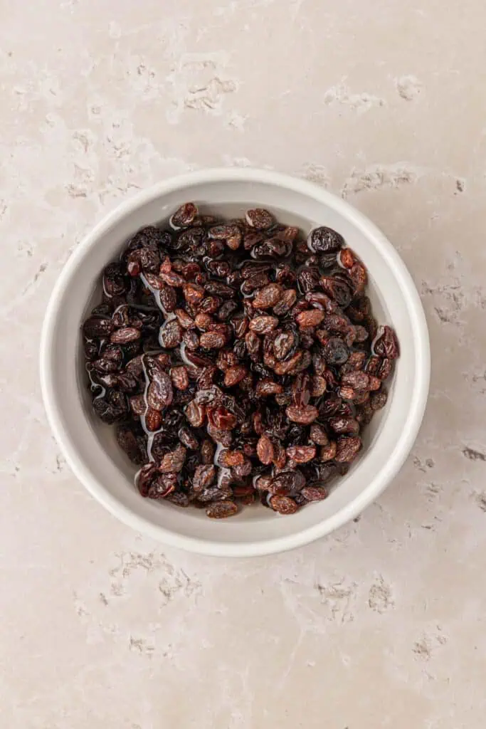 bowl of raisins soaking in water