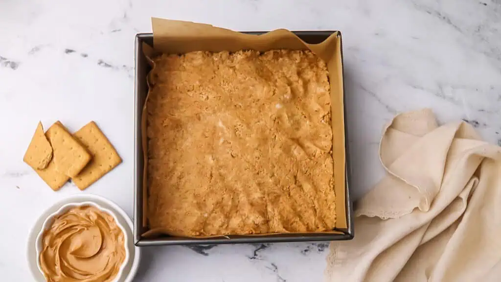 peanut butter mixture pressed into a square pan
