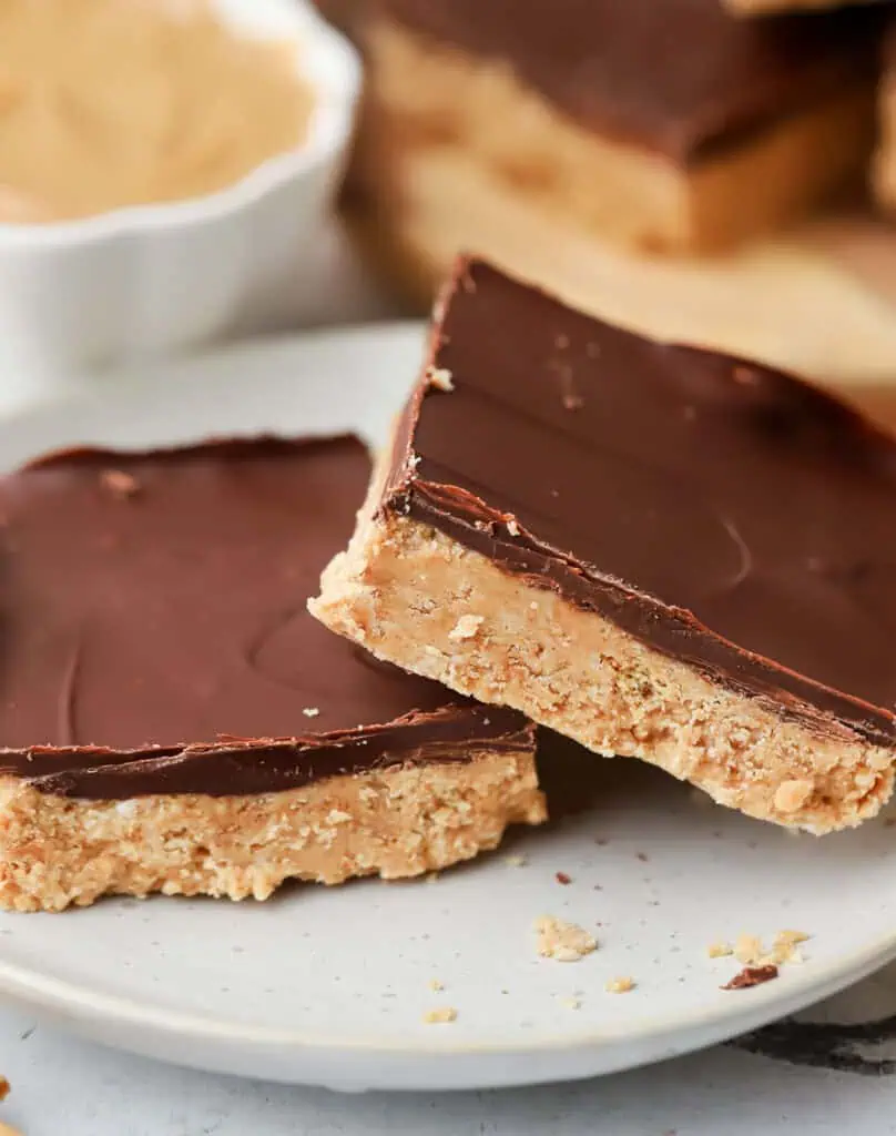 two no bake peanut butter bars on a plate