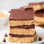 three no bake peanut butter bars on a plate
