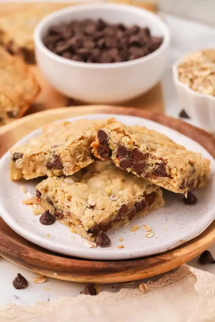 three oatmeal chocolate chip cookie bars on a plate