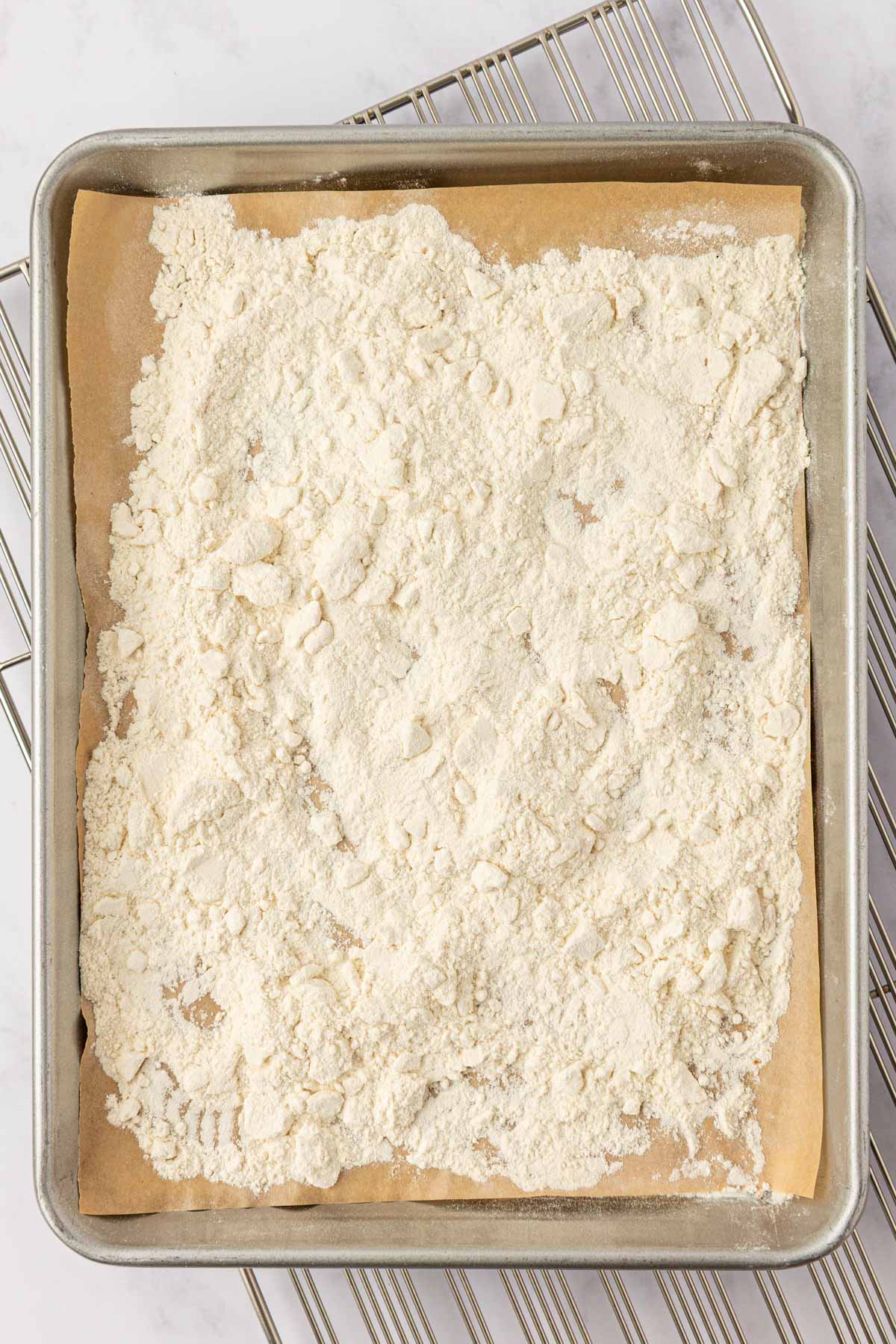 flour spread onto a cookie sheet