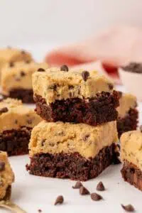 two cookie dough brownies stacked on top of each other