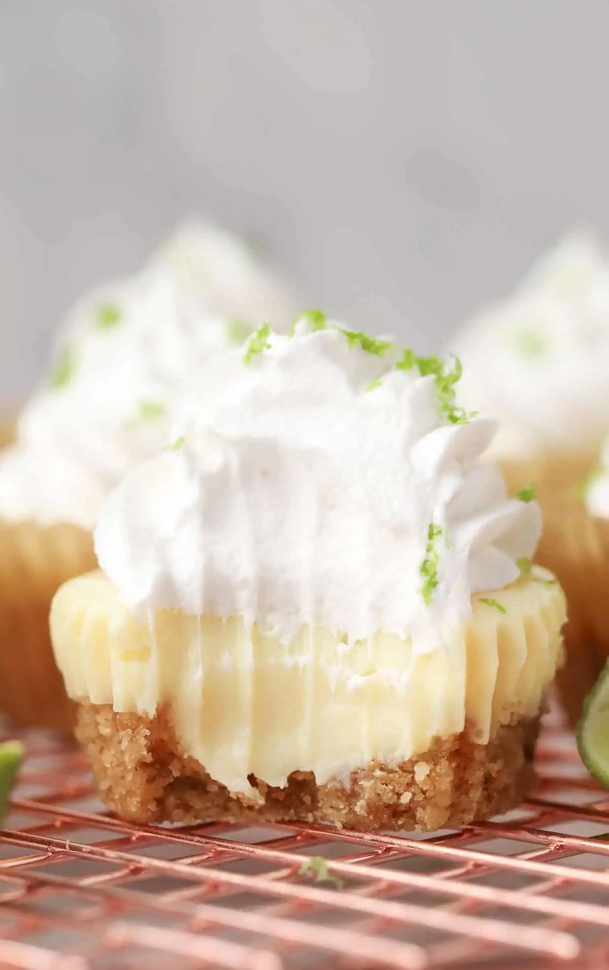 mini key lime pie with a bite taken out of it