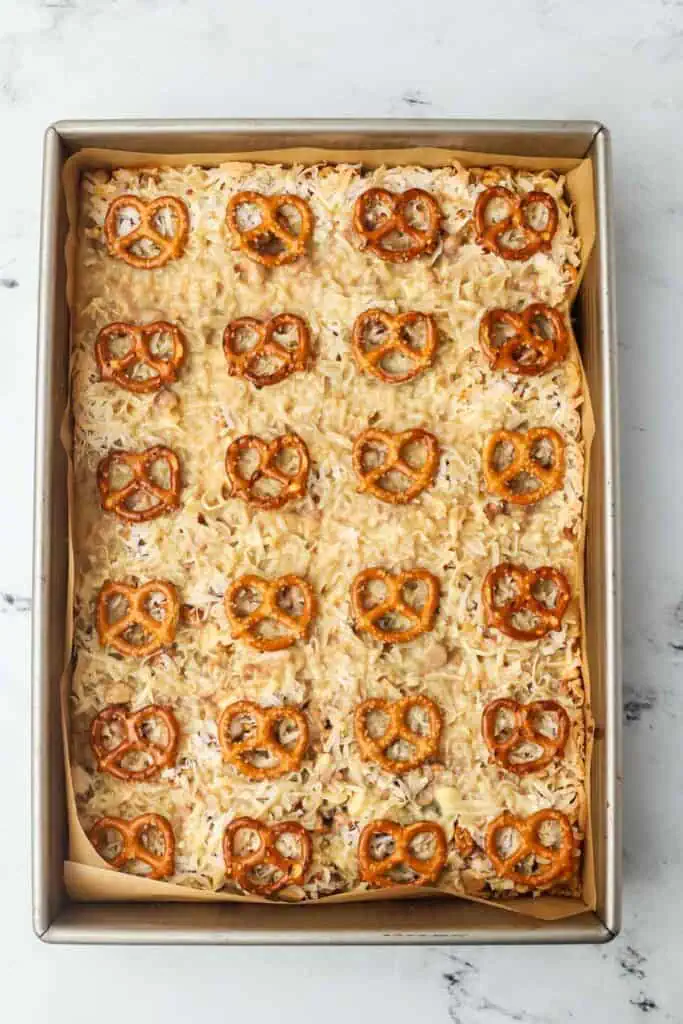 baked pretzel magic bars in a pan