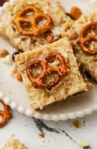 peanut butter pretzel magic bar on a plate