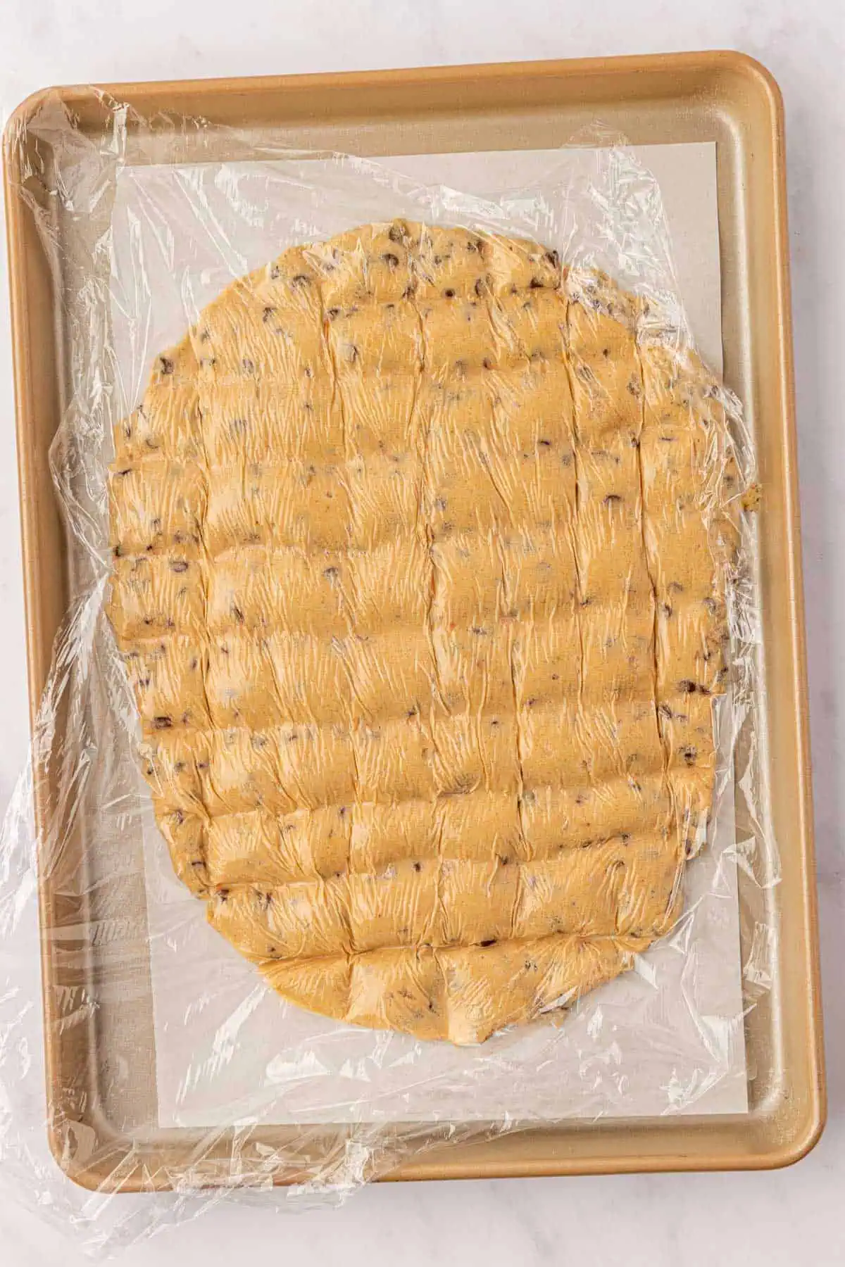 cookie dough scored with a knife