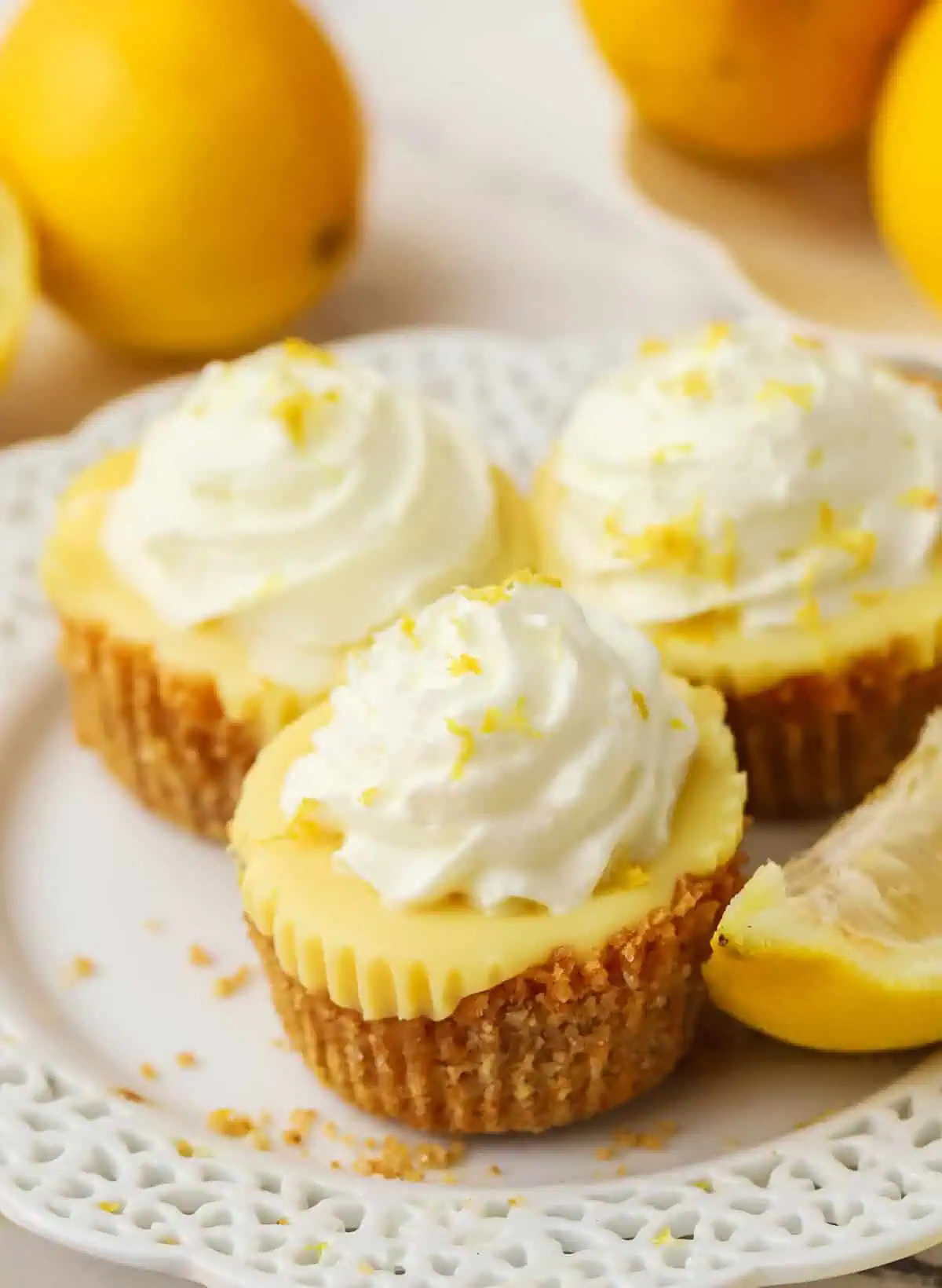 three mini lemon pies on a plate