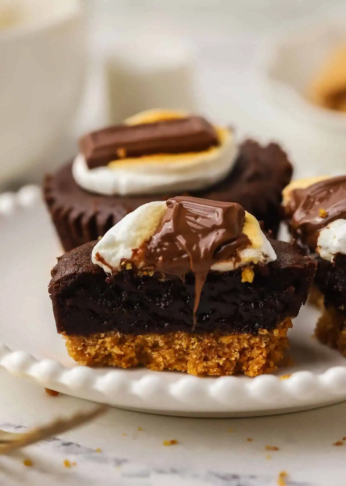 a smores brownie bite cut in half