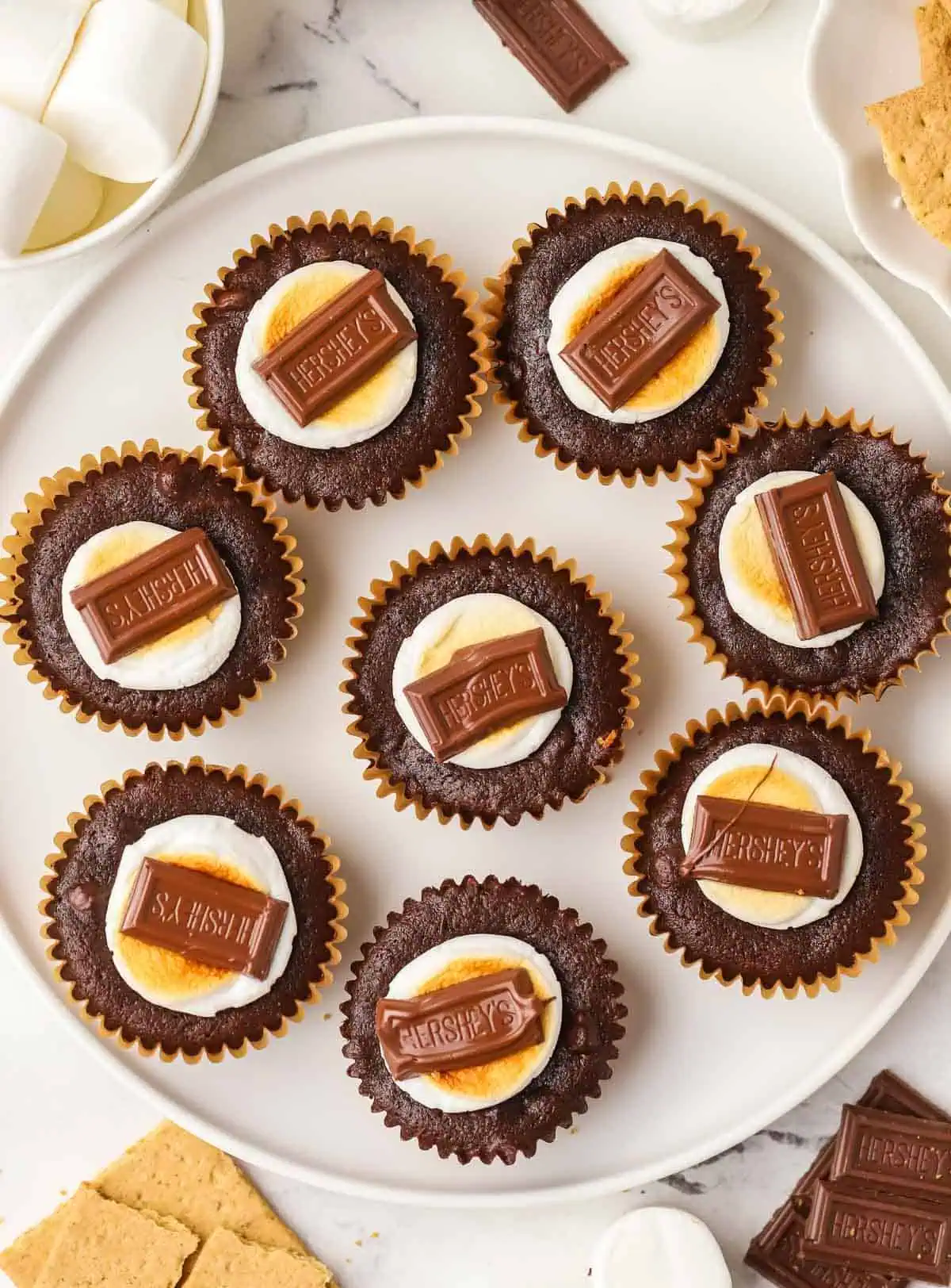 eight smores brownie bites on a plate