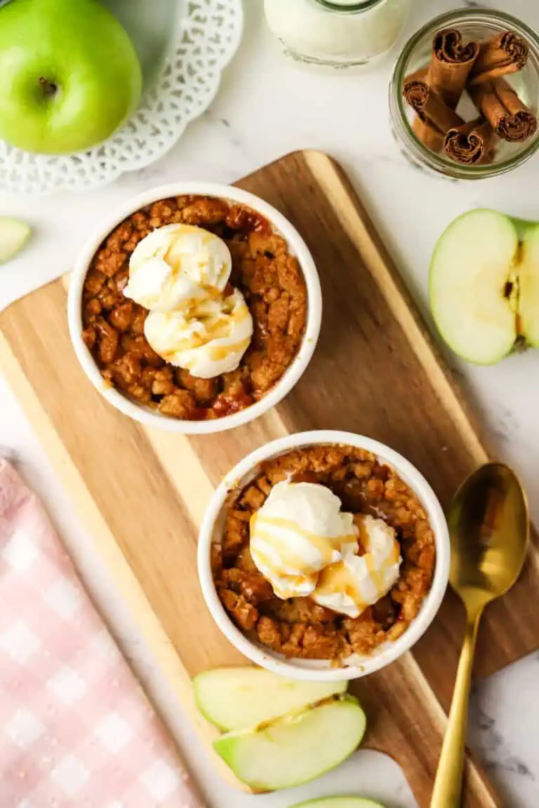 two apple crumbles in ramekins