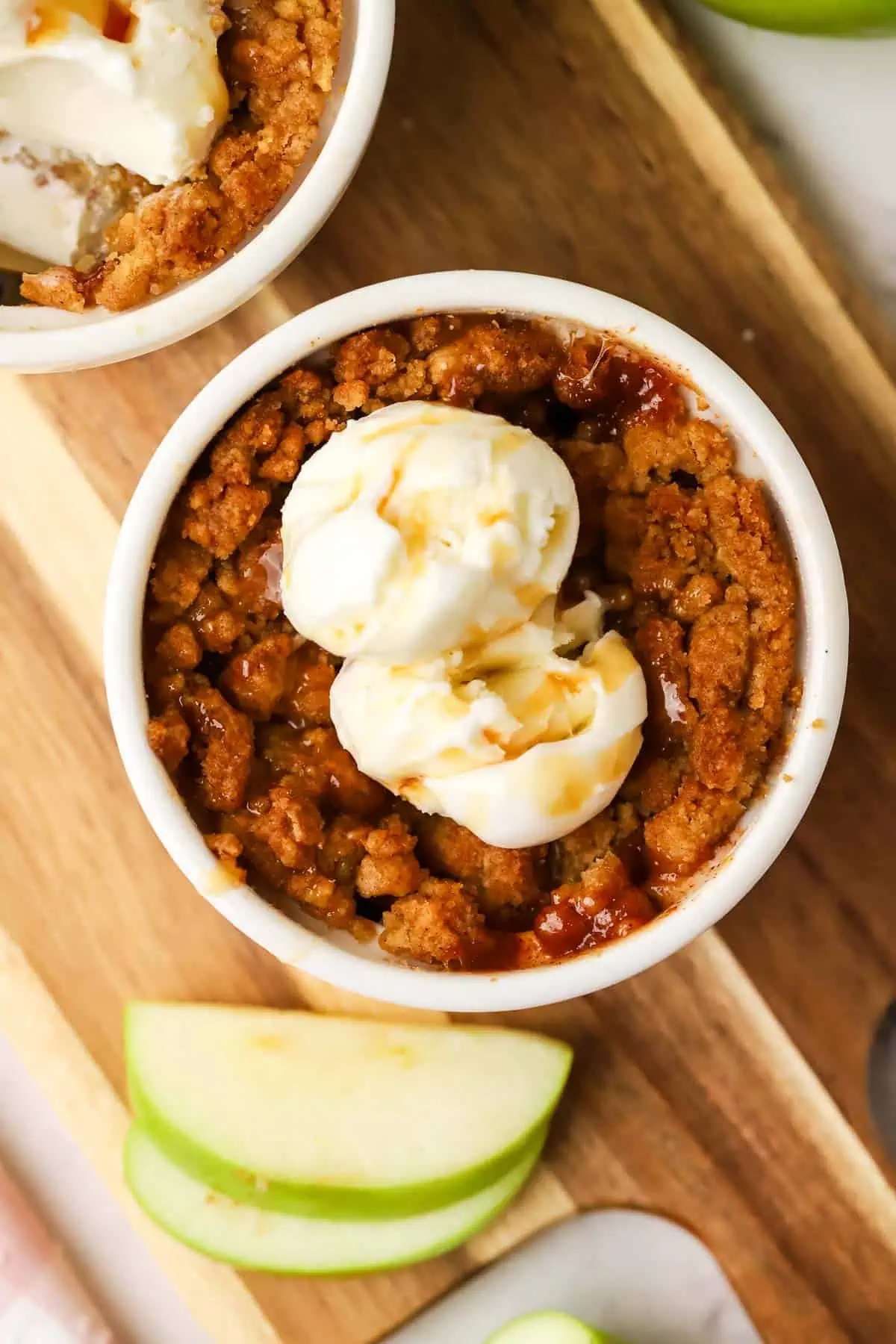 apple crumble ramekin topped with ice cream
