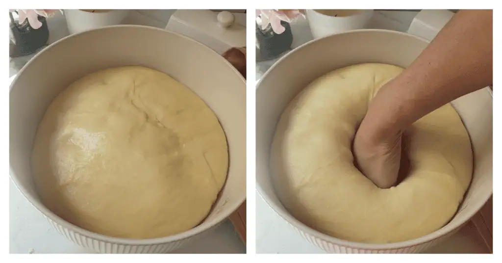 risen dough in a bowl punched down