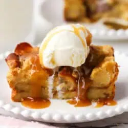 slice of small batch bread pudding topped with ice cream and caramel