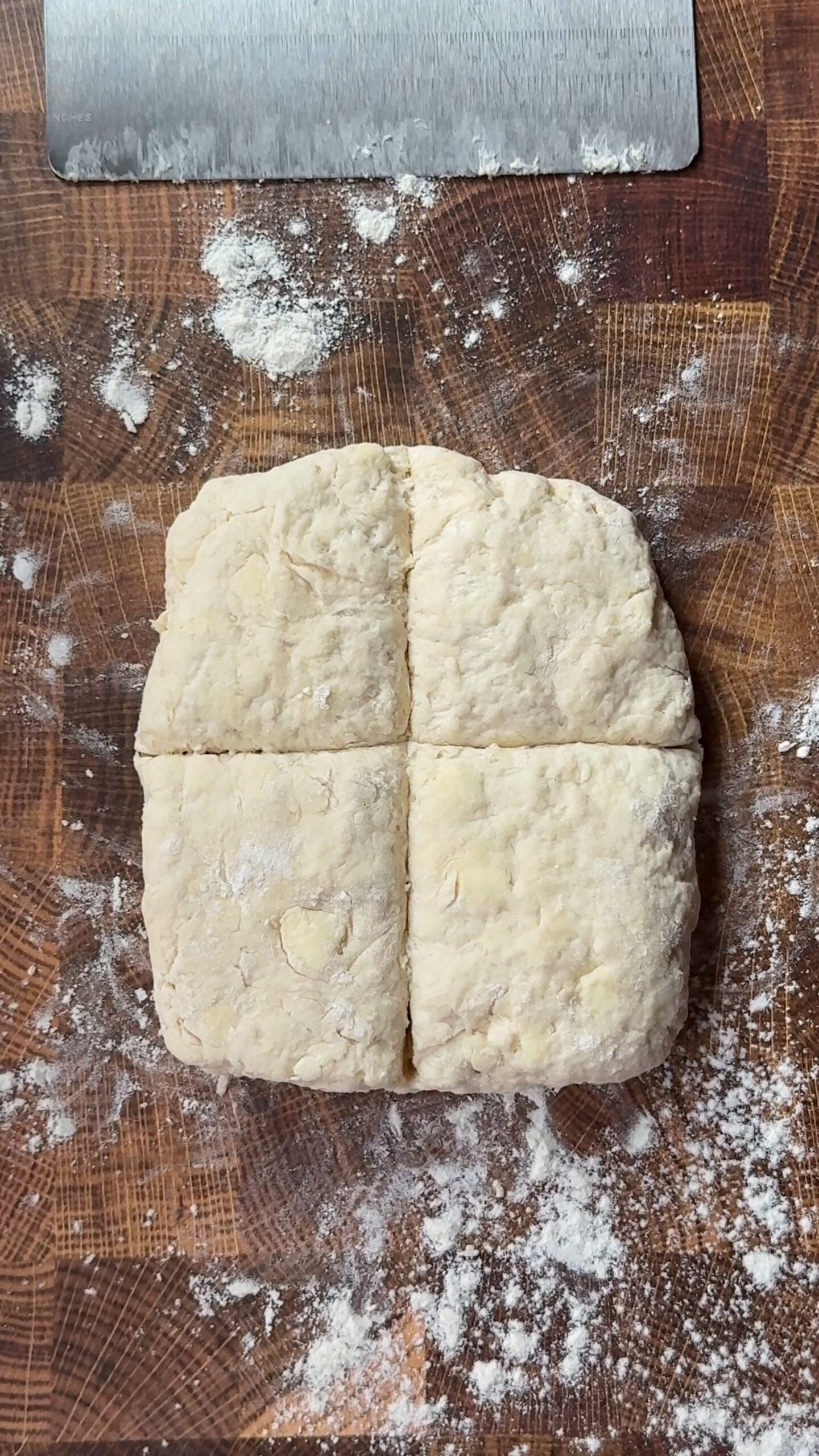 biscuit dough cut into four squares