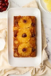 small batch pineapple upside down cake cut into four rectangles