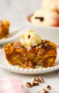 slice of small batch pumpkin bread pudding topped with ice cream