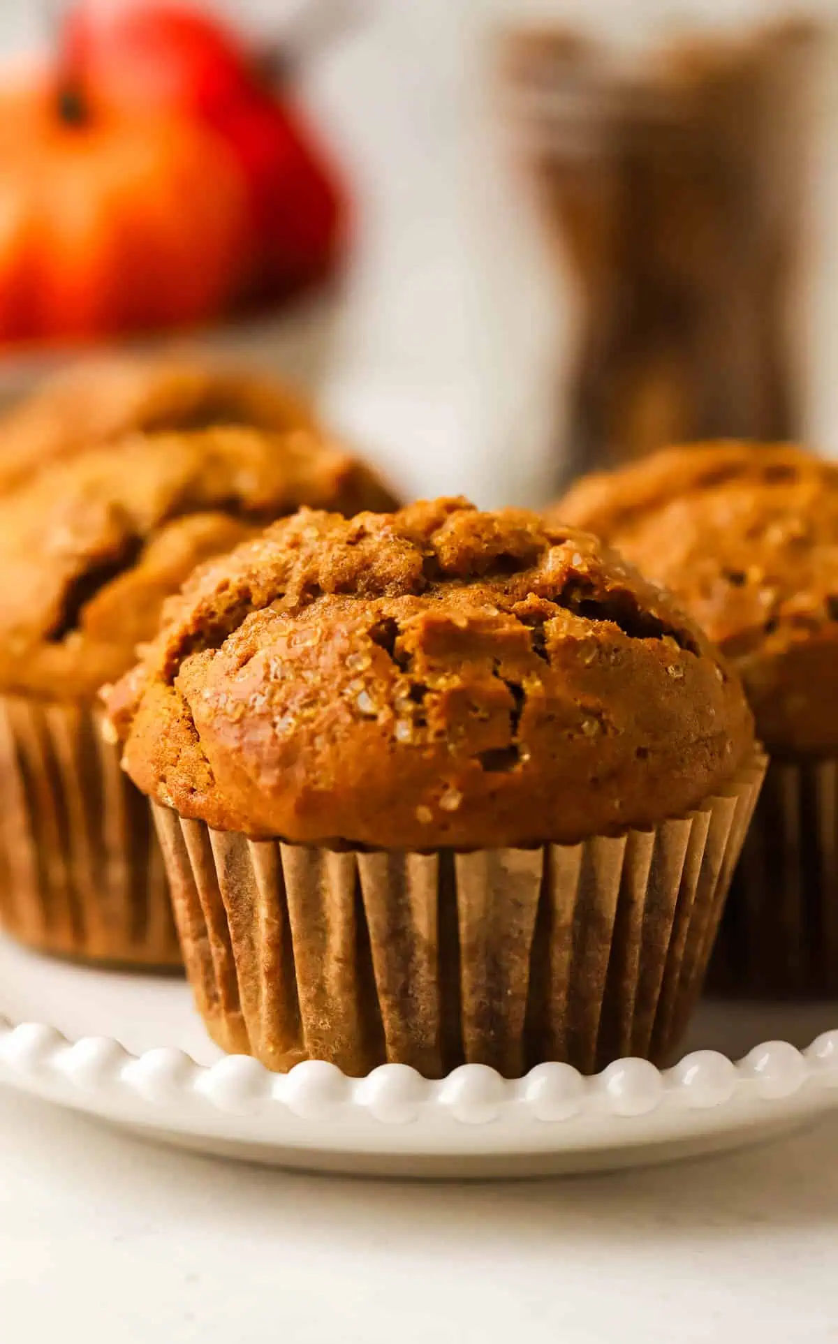 three muffins on a plate
