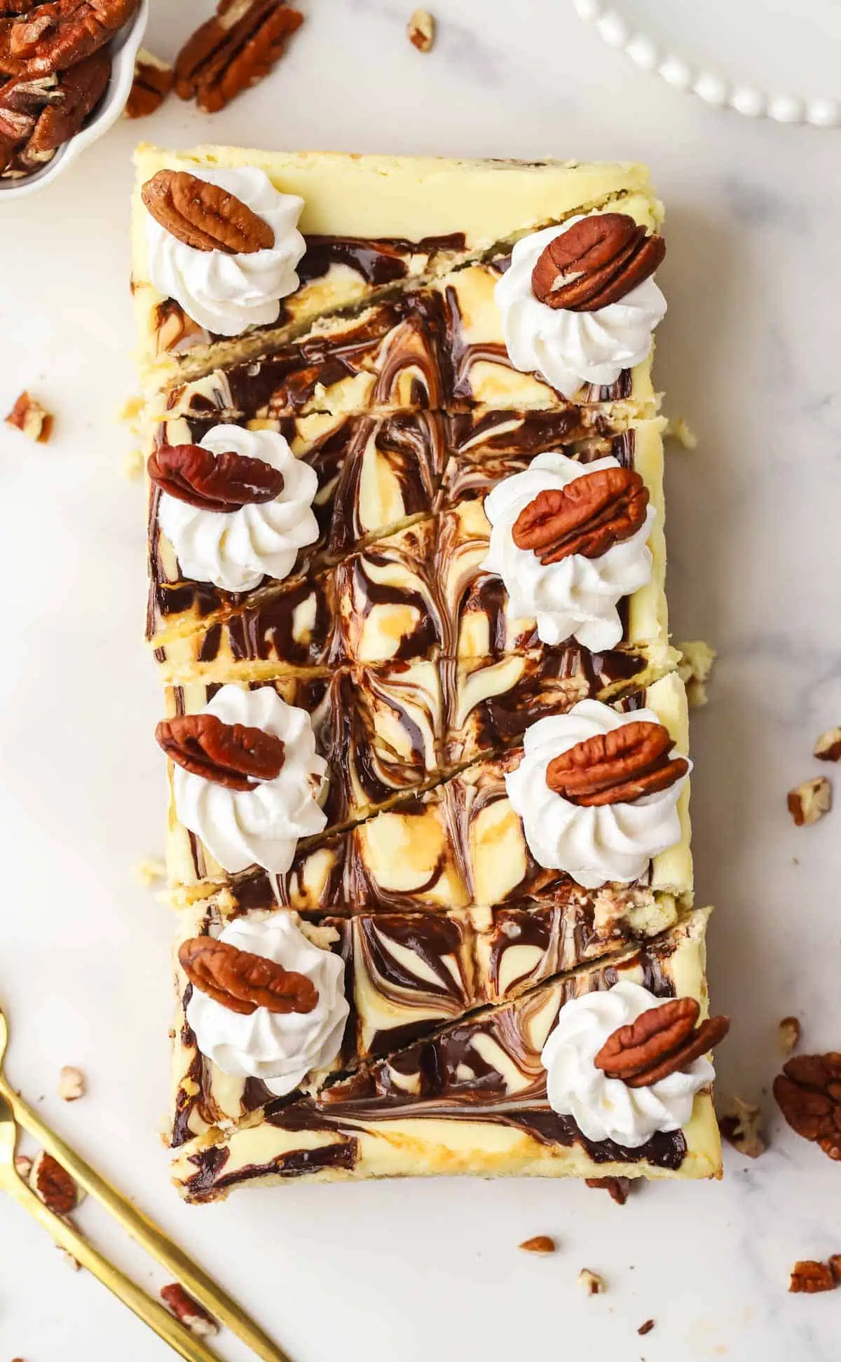 whole loaf pan turtle cheesecake cut into eight slices